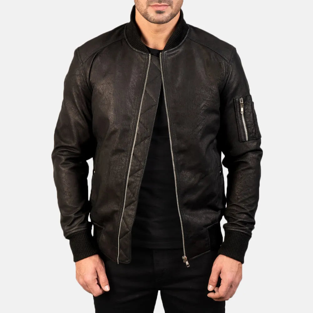 A sleek bomber jacket black crafted from genuine leather, exuding an air of sophistication and style.