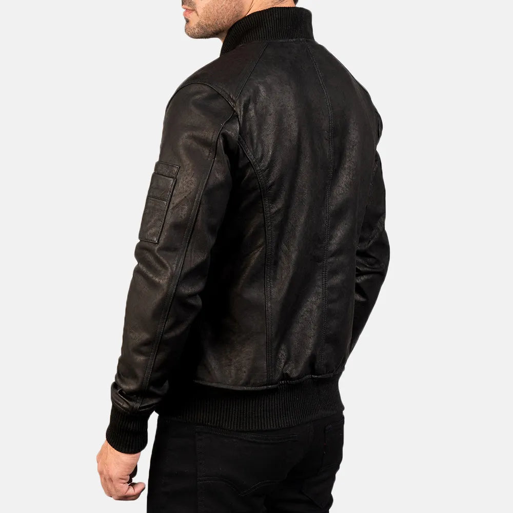 A sleek bomber jacket black crafted from genuine leather, exuding an air of sophistication and style.