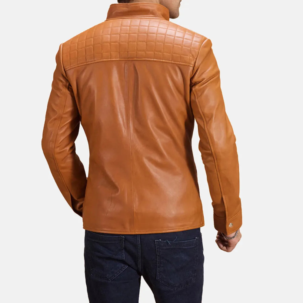A stylish man wearing a brown men's leather jacket, exuding confidence and a touch of ruggedness.