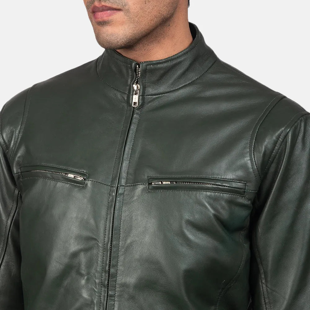 Unleash your inner rebel with this dark green biker jacket crafted from leather, a statement piece that exudes confidence.