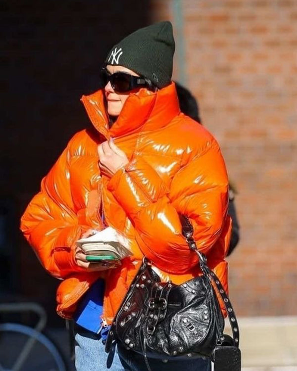 Dua Lipa’s Orange Puffer Jacket