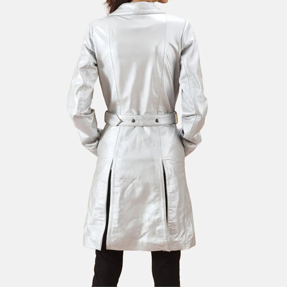 Woman in silver leather trench coat and black pants