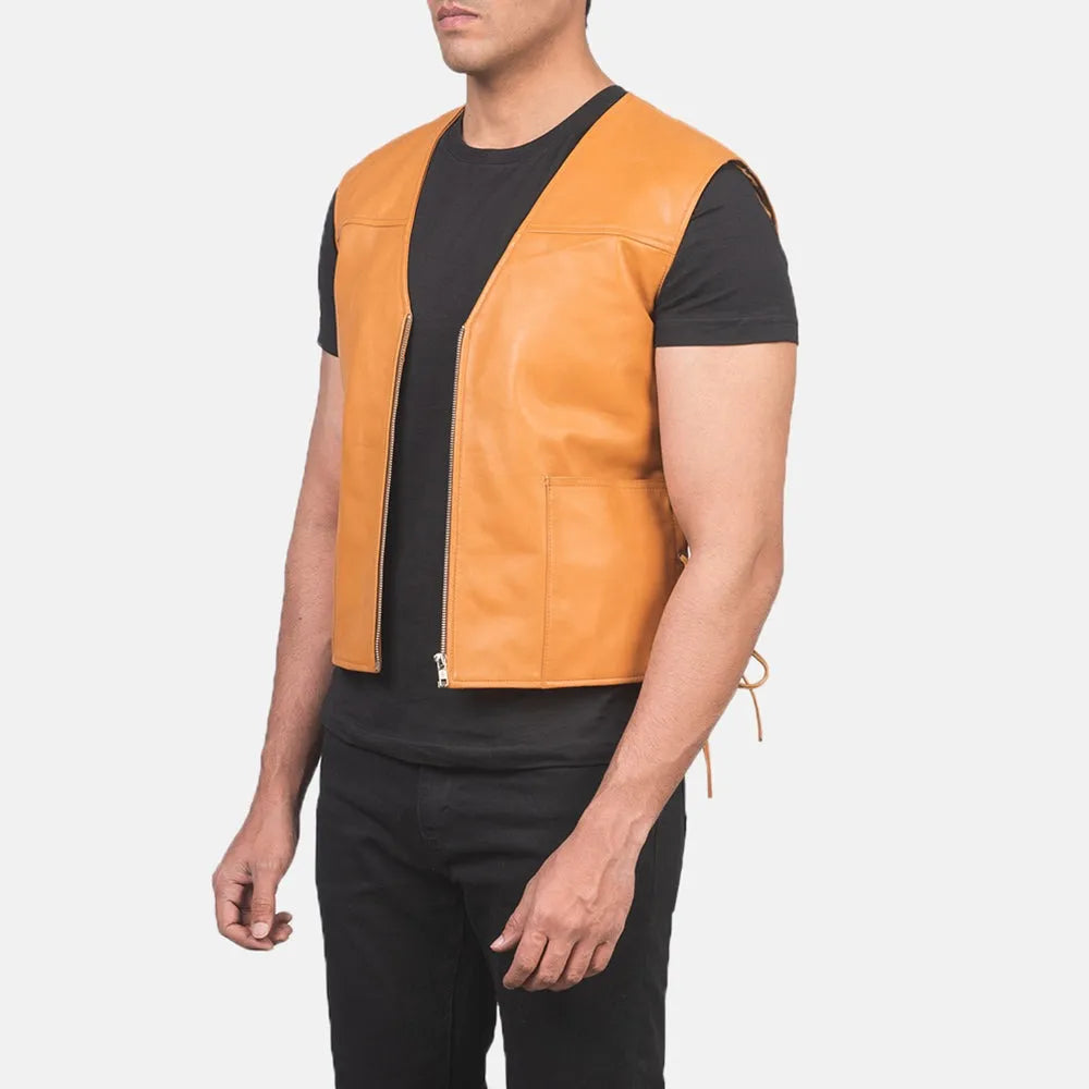 A leather vest, adds a touch of style to outfit with a trendy tan colour leather jacket.