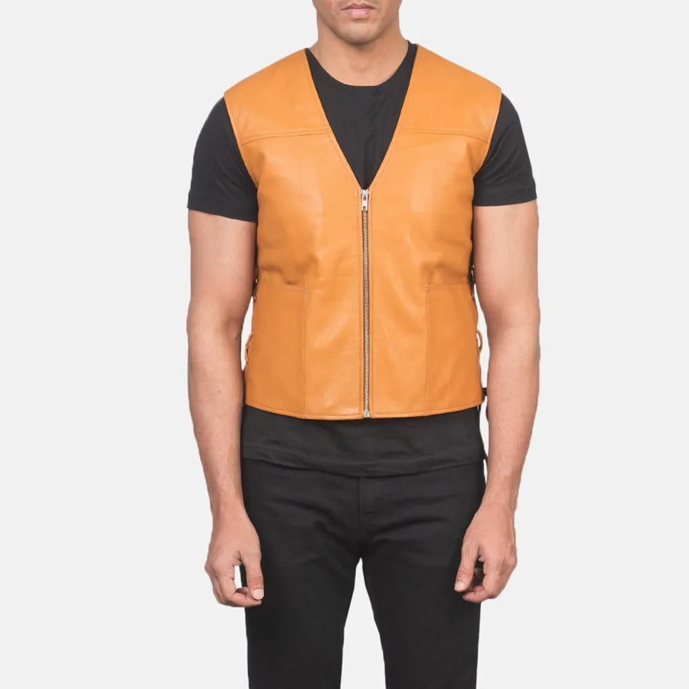 A leather vest, adds a touch of style to outfit with a trendy tan colour leather jacket.