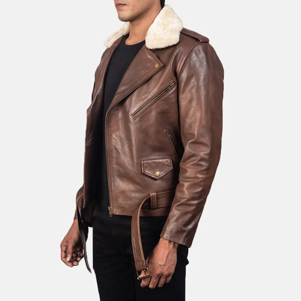 A stylish brown leather motorcycle jacket with a cozy shearling collar, perfect for adding a touch of rugged sophistication to any outfit.