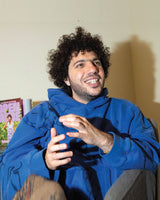 Benny Blanco Visits NYU Blue Hoodie