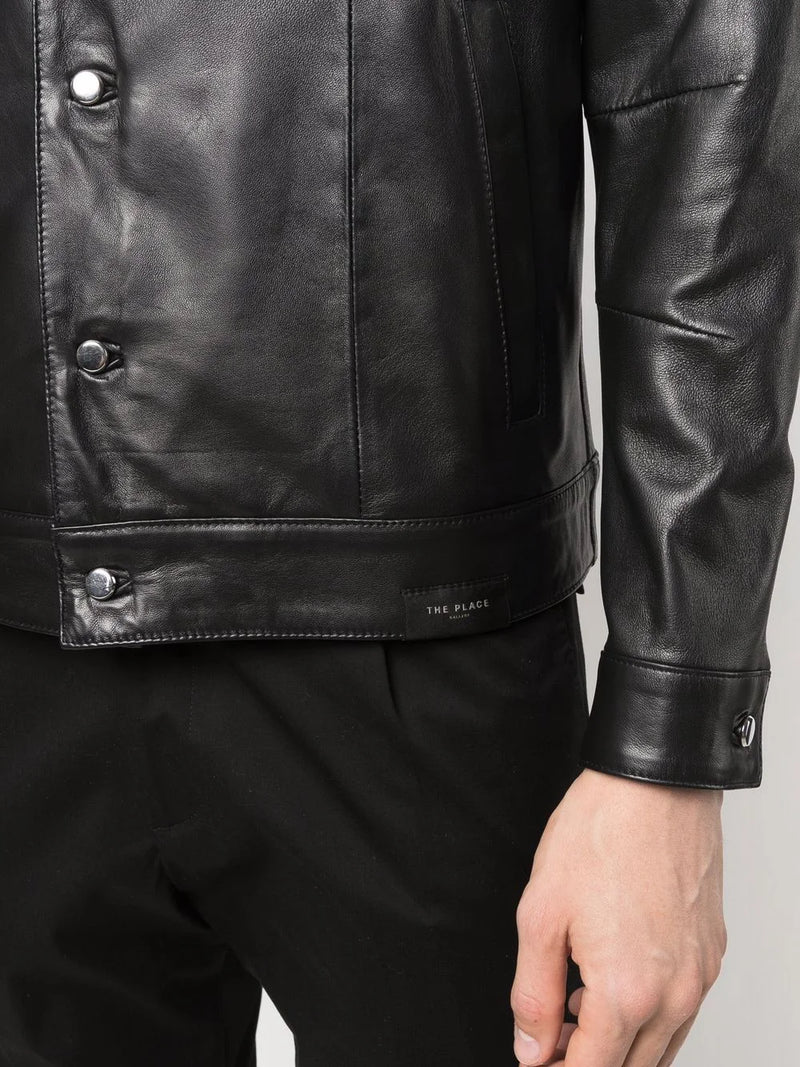 Showcasing trendy black leather shirt jacket and pants.