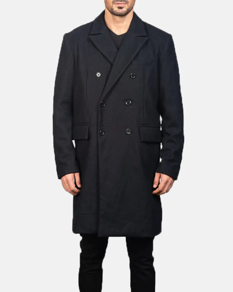 A fashionable man donning a black pea coat, exuding elegance and sophistication in his Black long leather coat.