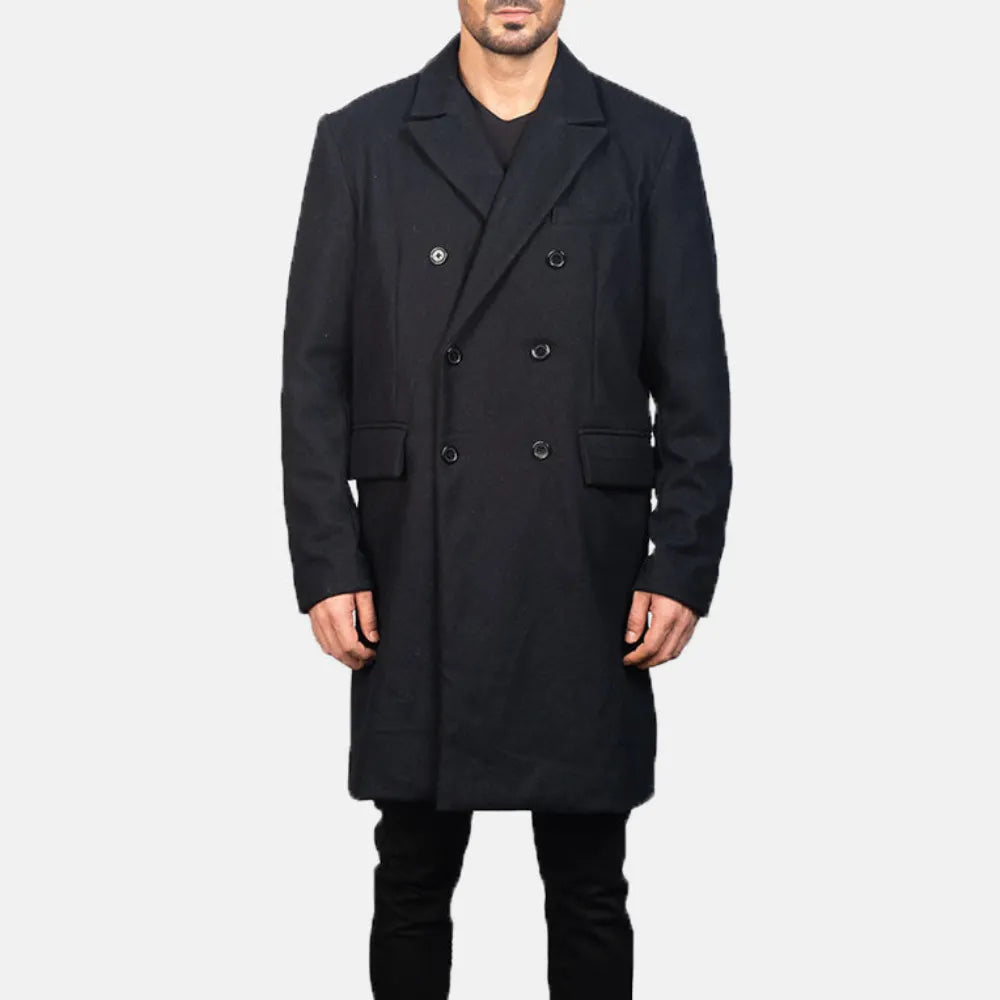 A fashionable man donning a black pea coat, exuding elegance and sophistication in his Black long leather coat.