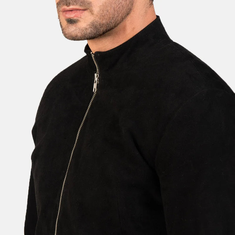 A stylish black suede jacket, perfect for any occasion. Its sleek design and soft texture make it a must-have in your wardrobe.