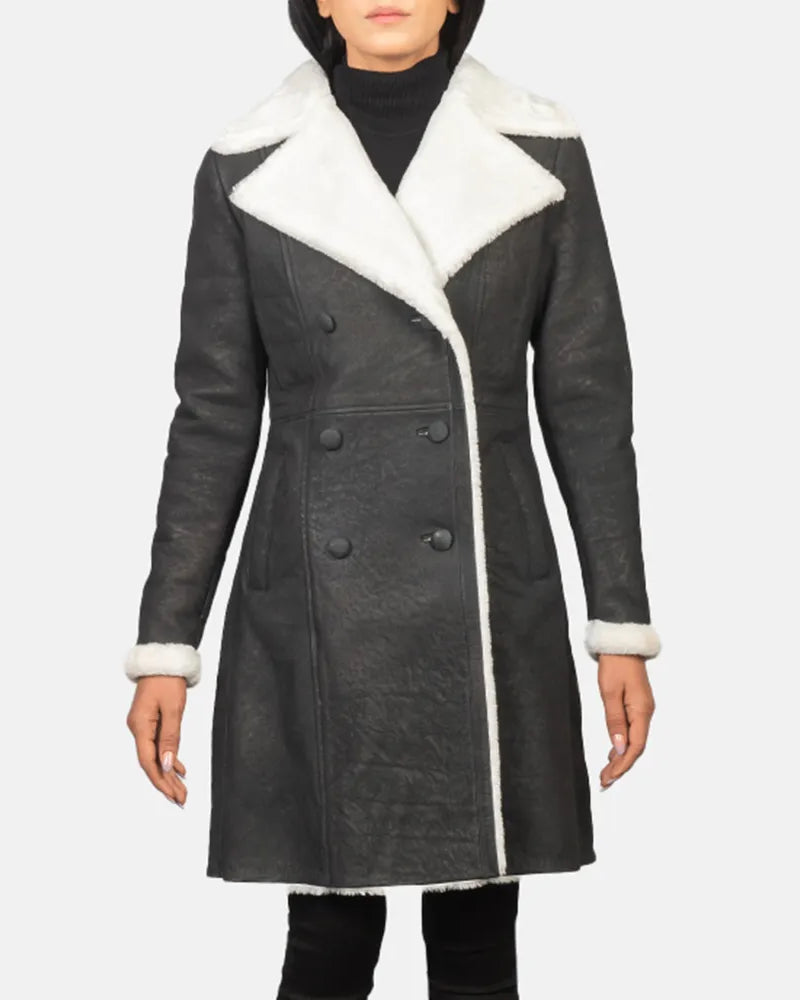 Stay cozy and chic in this black trench coat with white shearling details for women.