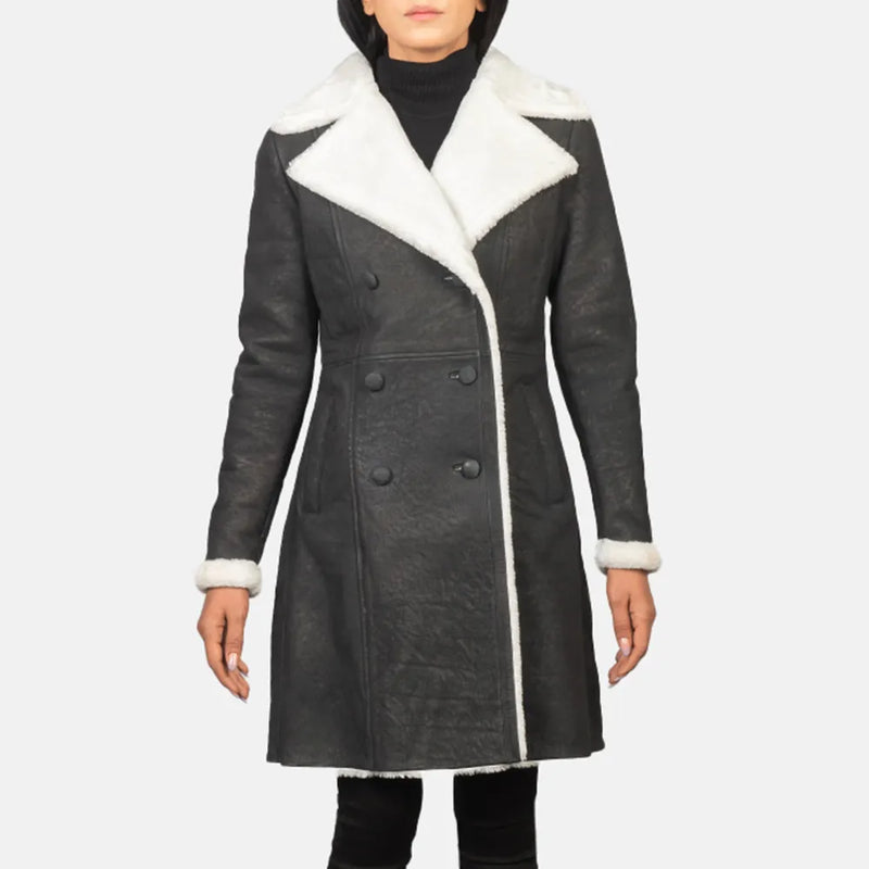 Stay cozy and chic in this black trench coat with white shearling details for women.