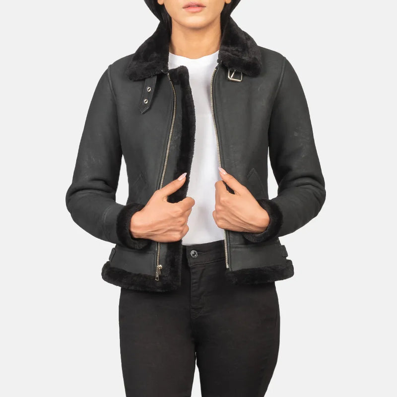 A cool black women's leather jacket. It's made of black leather and looks stylish and trendy.
