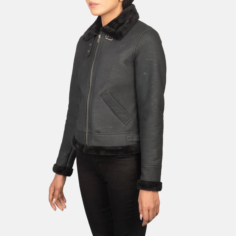 A cool black women's leather jacket. It's made of black leather and looks stylish and trendy.