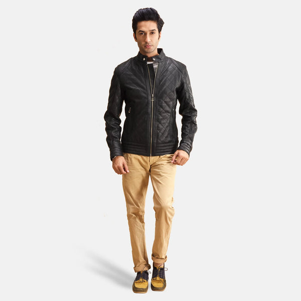 A fashionable man wearing a black zipper jacket. Ideal for a casual and laid-back vibe.