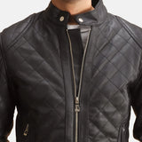 A fashionable man wearing a black zipper jacket. Ideal for a casual and laid-back vibe.