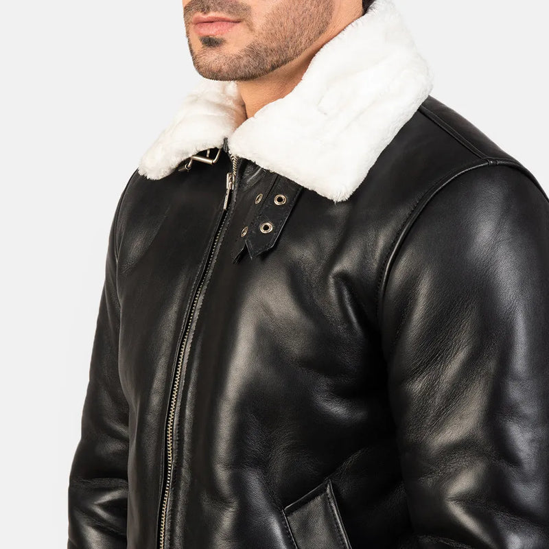Stay warm and fashionable in this black and white leather jacket with a sleek shearling collar.