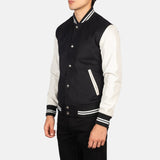 This black and white varsity jacket, crafted from a combination of cotton and wool, offers a fashionable outerwear option.