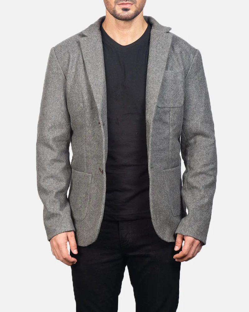 A dapper gentleman in a gray blazer leather jacket, showcasing a sleek and modern style.