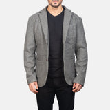 A dapper gentleman in a gray blazer leather jacket, showcasing a sleek and modern style.