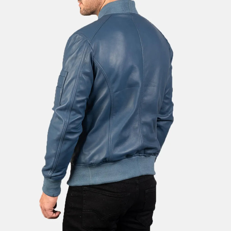 Men's trendy blue bomber jacket in sleek leather material.