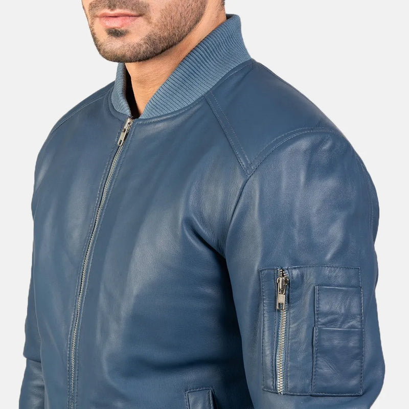 Men's trendy blue bomber jacket in sleek leather material.