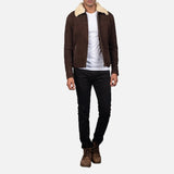 A stylish suede brown fur jacket with a cozy shearling collar, perfect for chilly days.