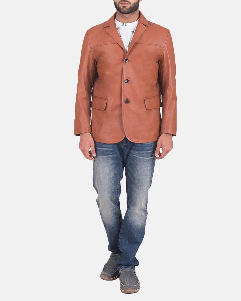 Trendy guy rocking a tan brown leather blazer jacket, showcasing his fashion sense.