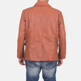 Trendy guy rocking a tan brown leather blazer jacket, showcasing his fashion sense.