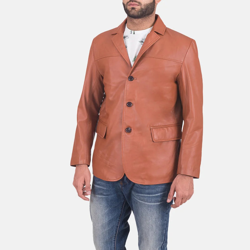 Trendy guy rocking a tan brown leather blazer jacket, showcasing his fashion sense.