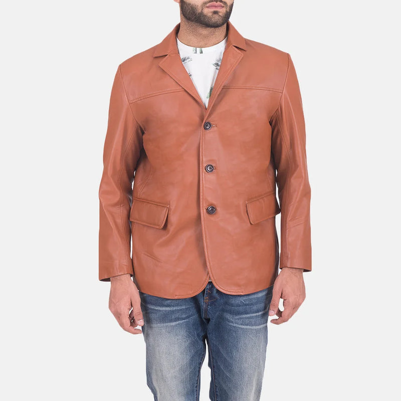 Trendy guy rocking a tan brown leather blazer jacket, showcasing his fashion sense.