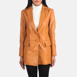This fashion-forward lady exudes confidence in her trendy brown leather blazer, elevating her outfit effortlessly.