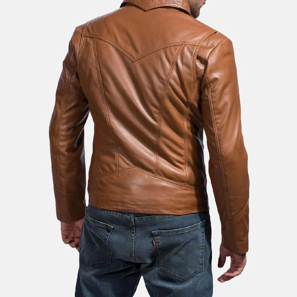 A suave man donning a brown leather shirt jacket, epitomizing timeless coolness and making a bold fashion statement.