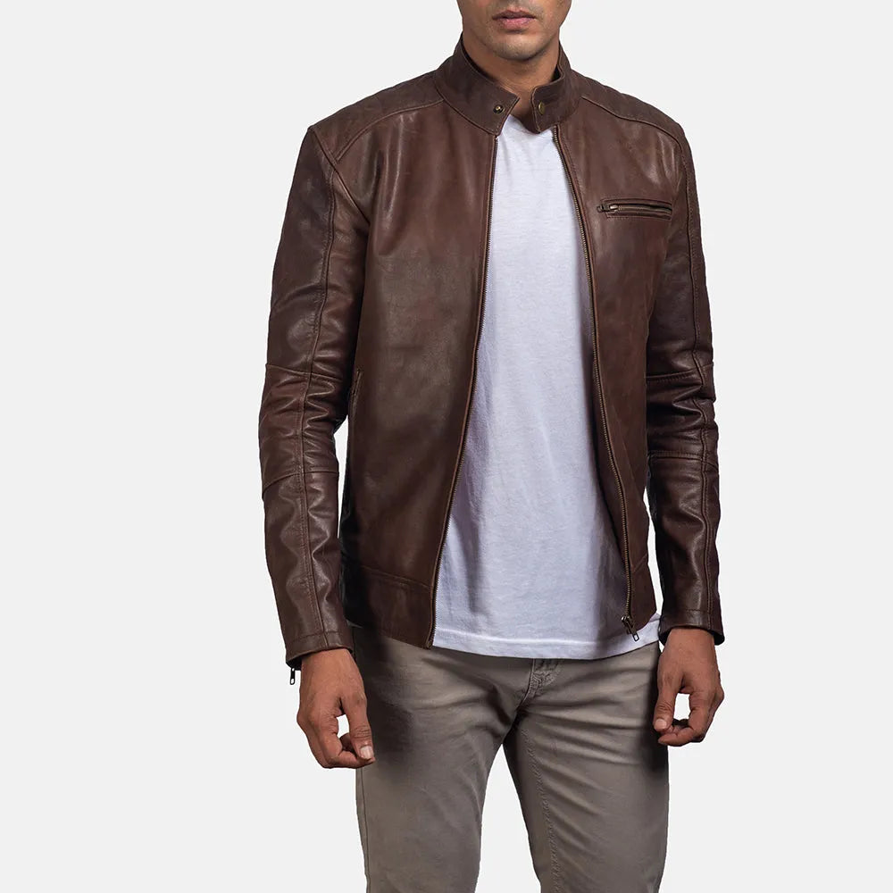 A man wearing a brown leather jacket, exuding style and confidence in his trendy brown moto jacket men's.