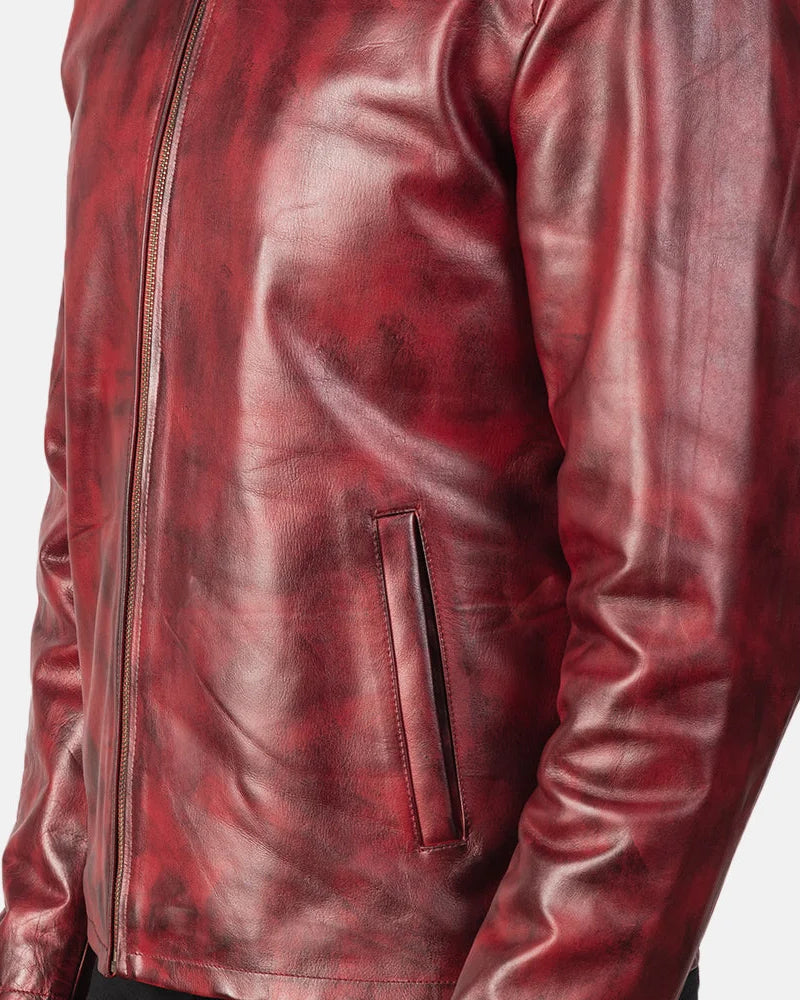 A stylish burgundy leather jacket, crafted from cowhide leather, adds a touch of sophistication to any outfit.