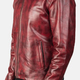 A stylish burgundy leather jacket, crafted from cowhide leather, adds a touch of sophistication to any outfit.