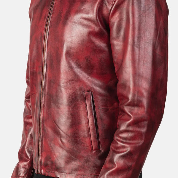 A stylish burgundy leather jacket, crafted from cowhide leather, adds a touch of sophistication to any outfit.