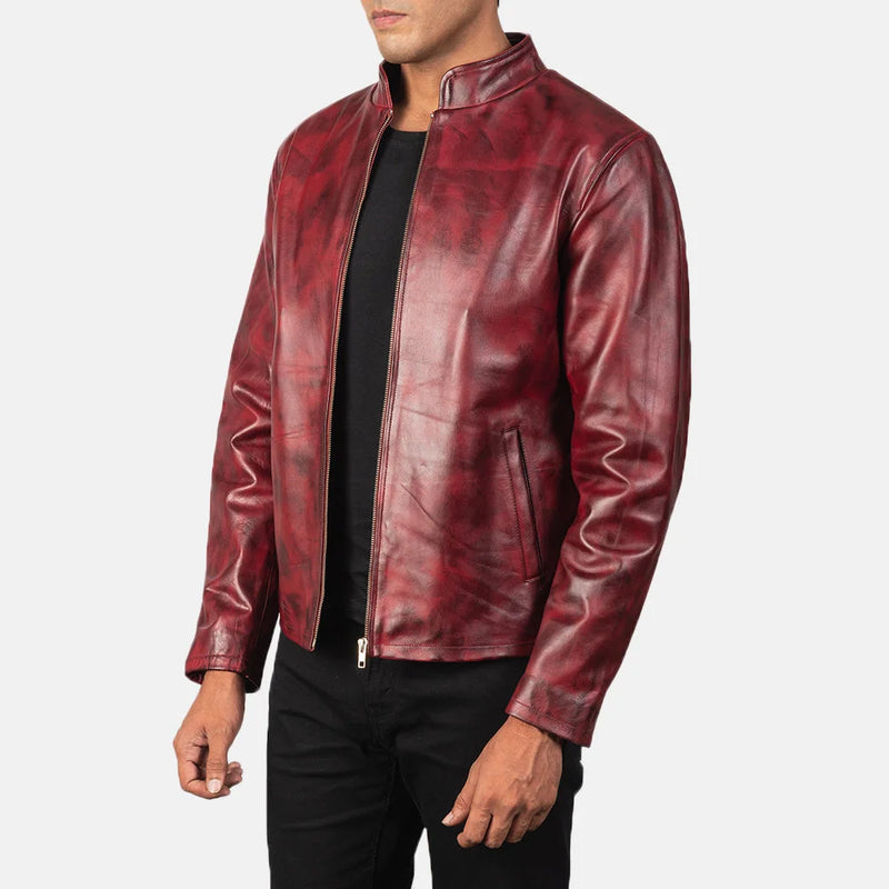 A stylish burgundy leather jacket, crafted from cowhide leather, adds a touch of sophistication to any outfit.