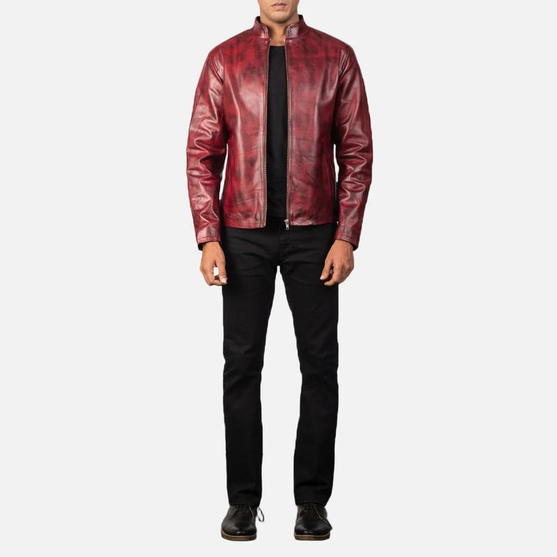 A stylish burgundy leather jacket, crafted from cowhide leather, adds a touch of sophistication to any outfit.