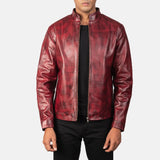 A stylish burgundy leather jacket, crafted from cowhide leather, adds a touch of sophistication to any outfit.