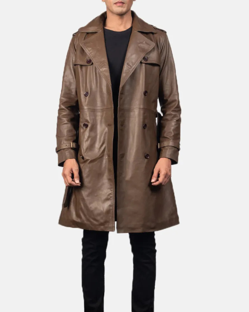 A stylish man wearing a distressed brown leather coat, exuding an air of mystery and sophistication.