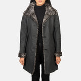 A chic Female trench coat made from leather, ideal for a fashionable and cruelty-free look.
