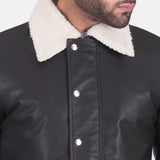 Stylish black leather jacket with shearling collar, perfect for staying warm and looking cool.