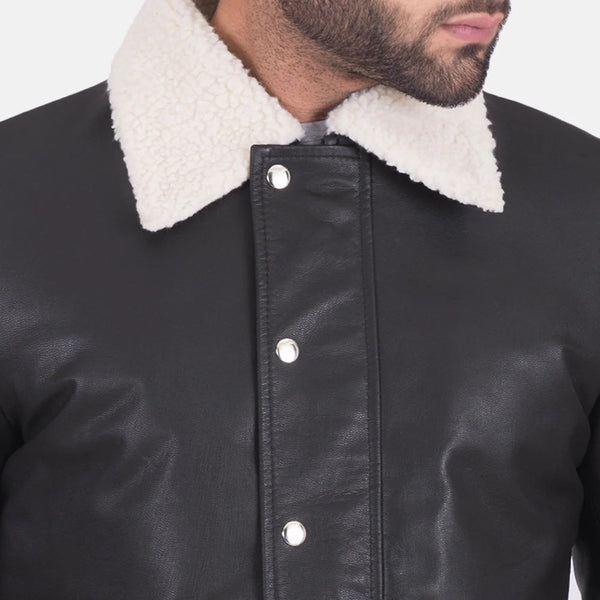 Stylish black leather jacket with shearling collar, perfect for staying warm and looking cool.