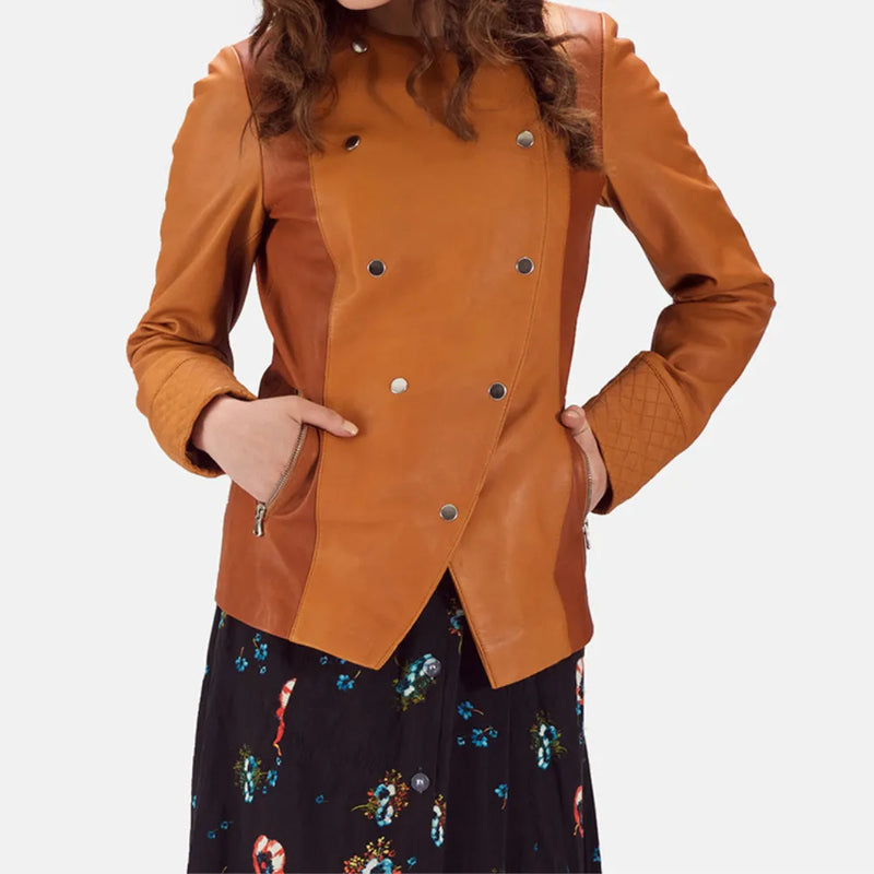 A woman in a leather brown jacket and floral skirt, looking stylish and confident.