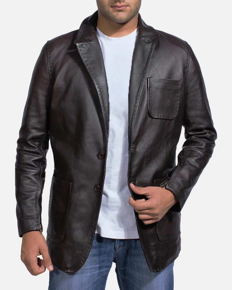 A man wearing a black leather jacket, also known as a Leather Jacket Blazer Men's.