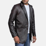 A man wearing a black leather jacket, also known as a Leather Jacket Blazer Men's.