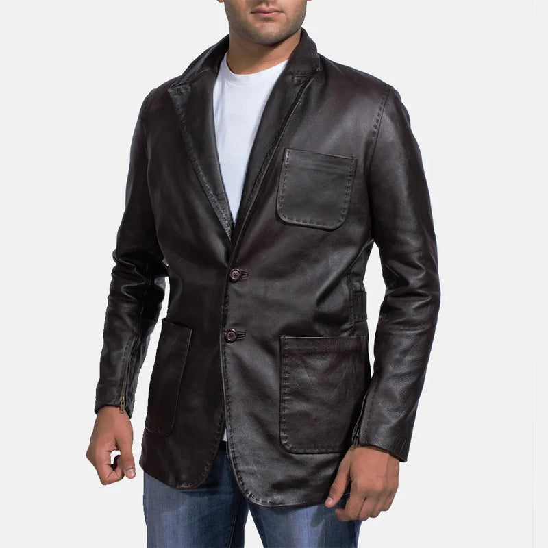 A man wearing a black leather jacket, also known as a Leather Jacket Blazer Men's.