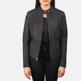 A black women's leather racing jacket with sleeve zippers.