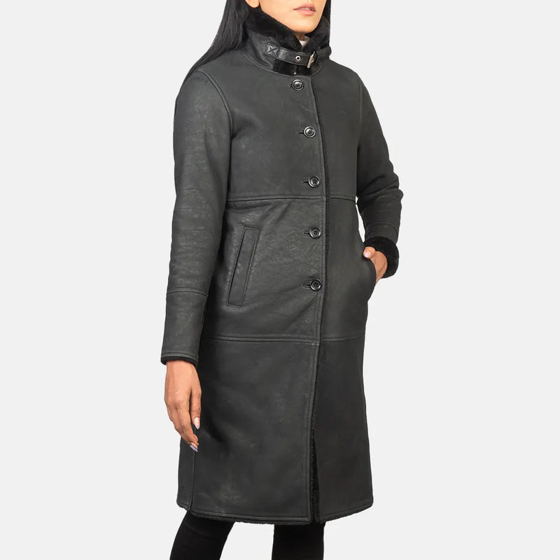 A long black trench coat made from sheepskin, providing a stylish and warm outerwear option.